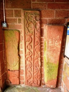 grave covers in south porch at St.Marys church, Gosforthc